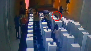 Watch a Woman Destroy $200,000 Worth of Art While Taking a Selfie